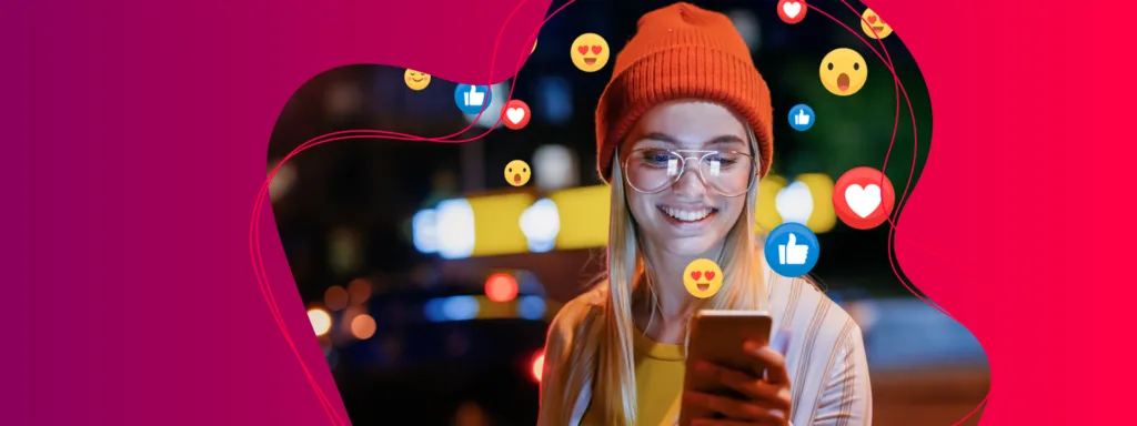 Junge Frau schaut auf ihr Smartphone; um sie herum schweben Likes, Herzen und Emojis.